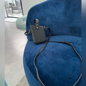 Bandolier universal cell phone pouch/crossbod.